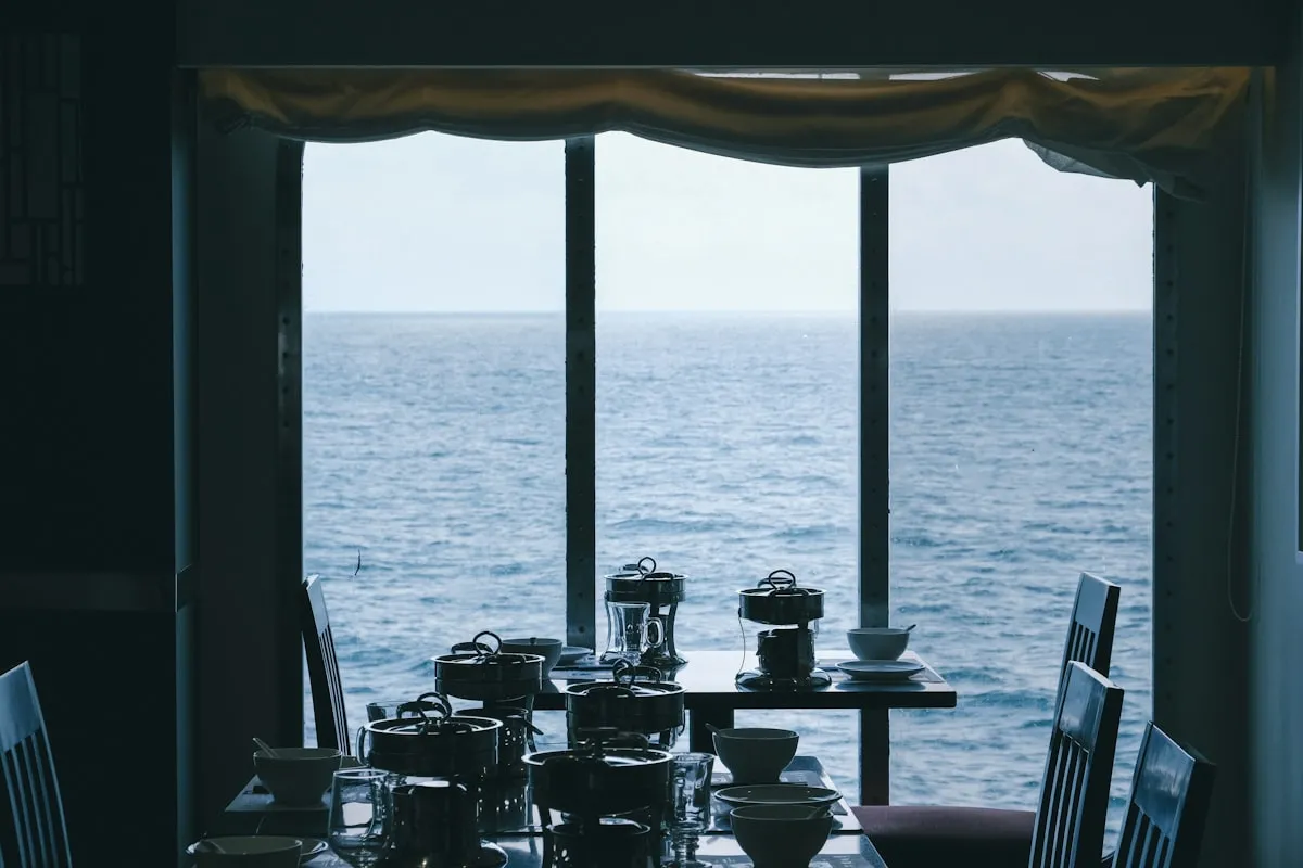 Elegant dining aboard a luxury yacht with ocean view